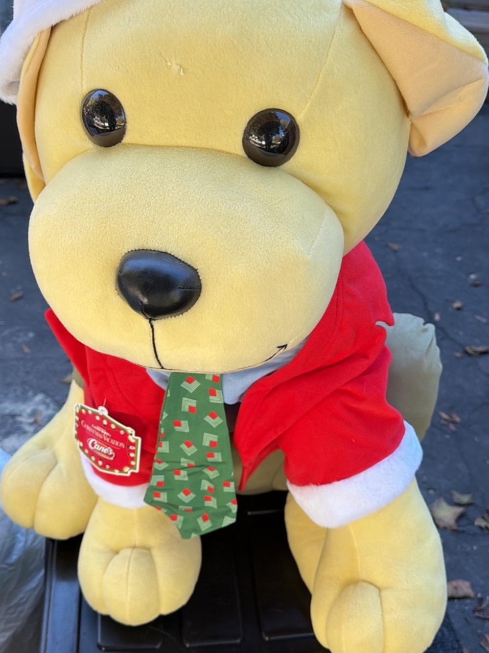 XXL Plush Yellow Holiday Dog with Red Jacket and Green Tie - Raising Cane